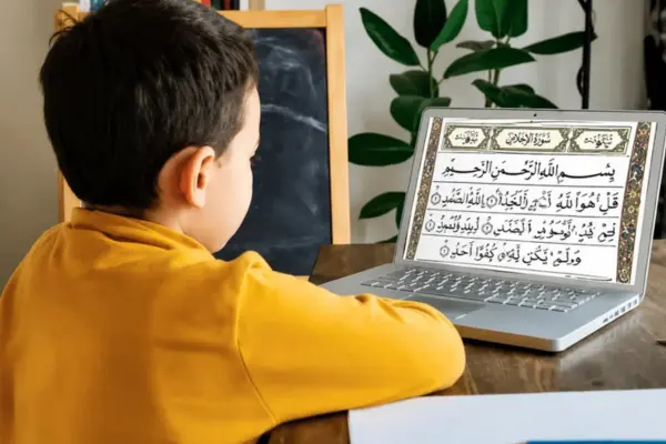A young student learning Quran online from an expert tutor by Al Balagh Institute